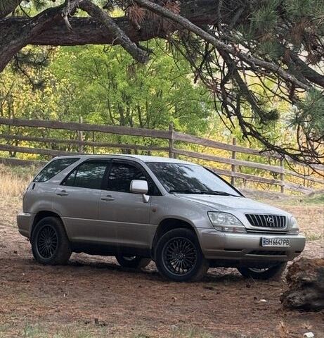Серый Лексус РХ, объемом двигателя 3 л и пробегом 3 тыс. км за 5600 $, фото 1 на Automoto.ua