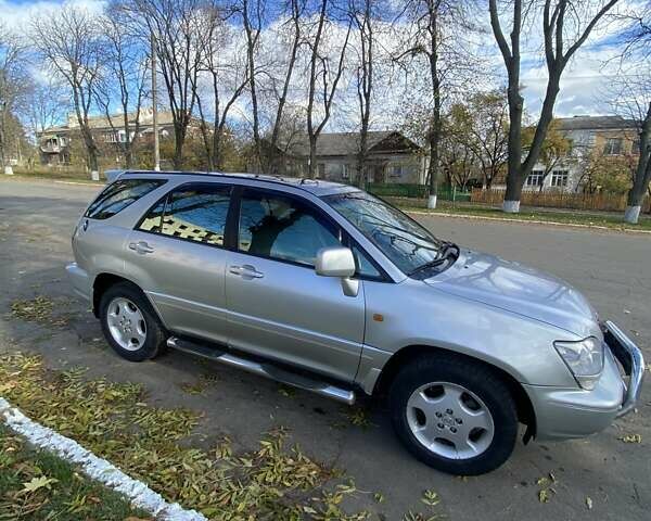 Серый Лексус РХ, объемом двигателя 3 л и пробегом 267 тыс. км за 7200 $, фото 1 на Automoto.ua