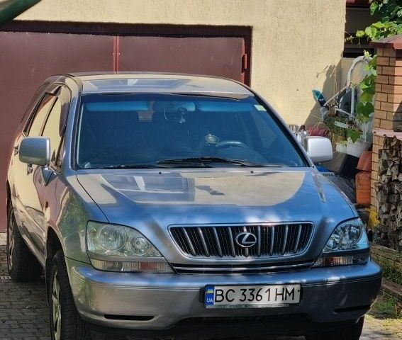 Серый Лексус РХ, объемом двигателя 3 л и пробегом 244 тыс. км за 7900 $, фото 1 на Automoto.ua