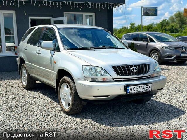Серый Лексус РХ, объемом двигателя 3 л и пробегом 290 тыс. км за 5999 $, фото 1 на Automoto.ua