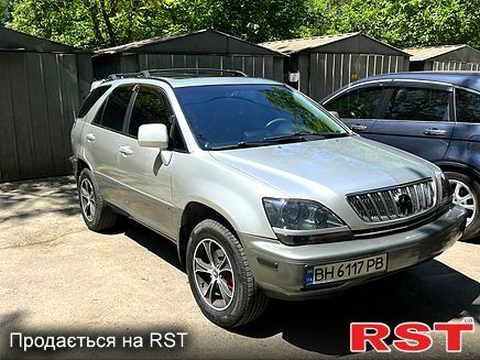 Серый Лексус РХ, объемом двигателя 3 л и пробегом 250 тыс. км за 7500 $, фото 1 на Automoto.ua