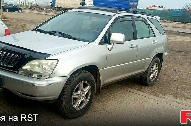 Сірий Лексус РХ, об'ємом двигуна 3 л та пробігом 250 тис. км за 5899 $, фото 1 на Automoto.ua