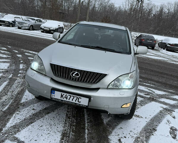 Серый Лексус РХ, объемом двигателя 3 л и пробегом 390 тыс. км за 6700 $, фото 1 на Automoto.ua