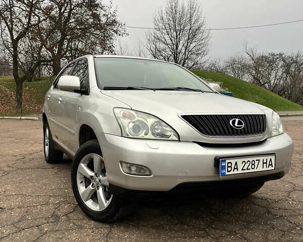 Серый Лексус РХ, объемом двигателя 3 л и пробегом 234 тыс. км за 8600 $, фото 1 на Automoto.ua
