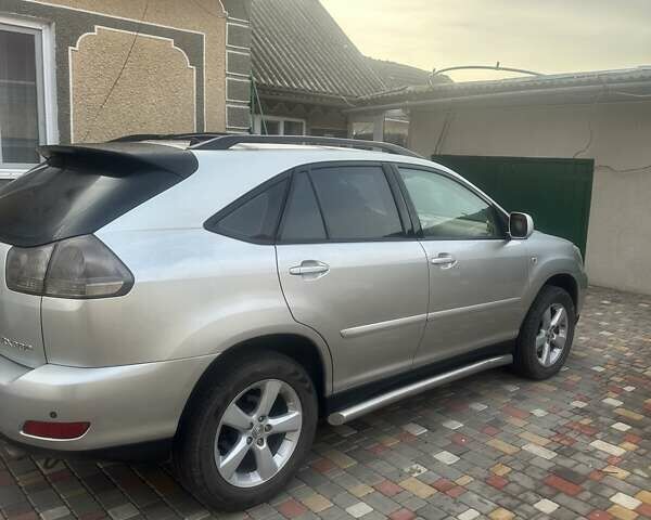 Серый Лексус РХ, объемом двигателя 3.3 л и пробегом 230 тыс. км за 10500 $, фото 1 на Automoto.ua