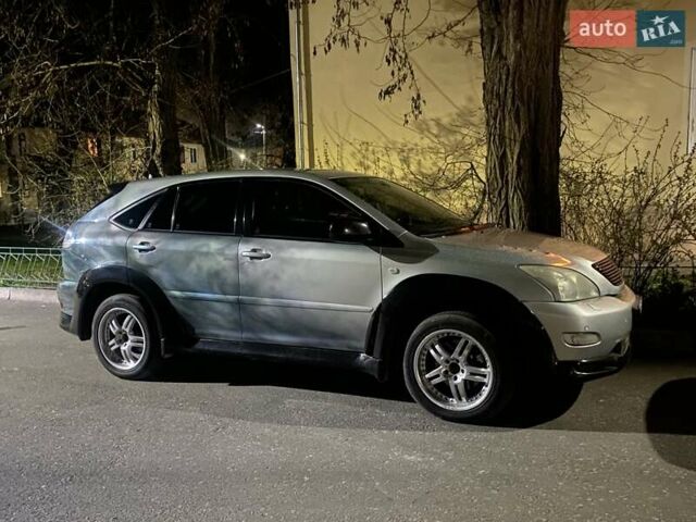 Серый Лексус РХ, объемом двигателя 3 л и пробегом 319 тыс. км за 7300 $, фото 1 на Automoto.ua