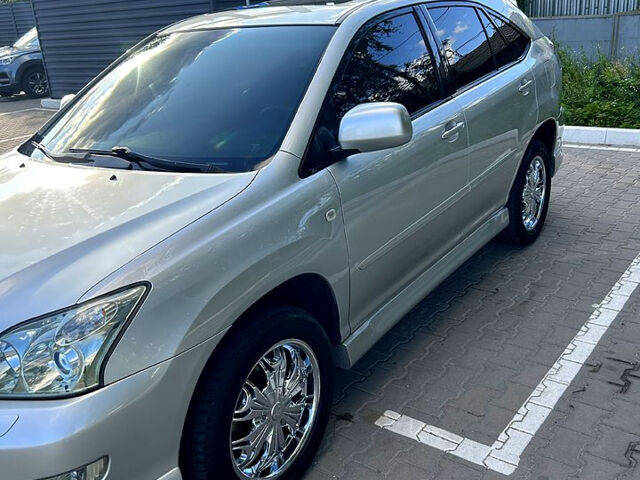 Серый Лексус РХ, объемом двигателя 3 л и пробегом 229 тыс. км за 9800 $, фото 1 на Automoto.ua