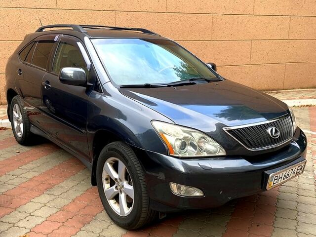 Серый Лексус РХ, объемом двигателя 3.5 л и пробегом 128 тыс. км за 10000 $, фото 1 на Automoto.ua