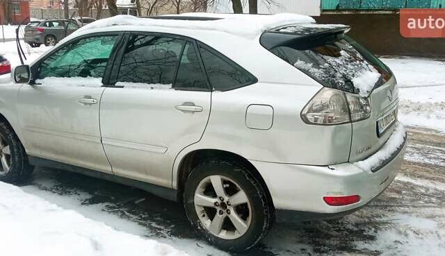 Сірий Лексус РХ, об'ємом двигуна 3.46 л та пробігом 250 тис. км за 8500 $, фото 1 на Automoto.ua