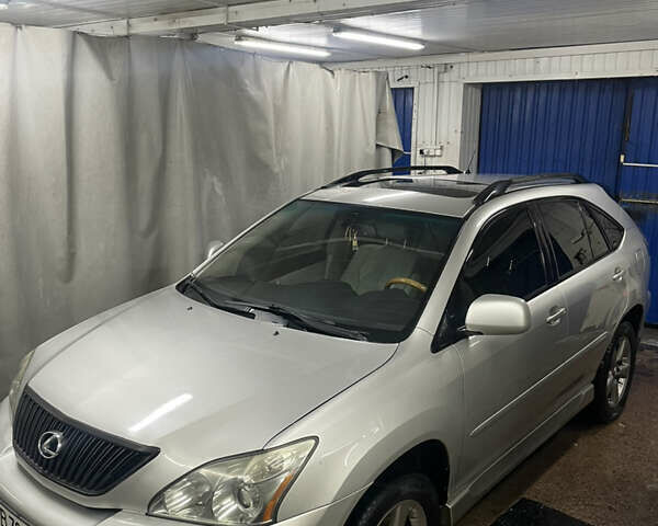 Сірий Лексус РХ, об'ємом двигуна 3.46 л та пробігом 235 тис. км за 10500 $, фото 1 на Automoto.ua
