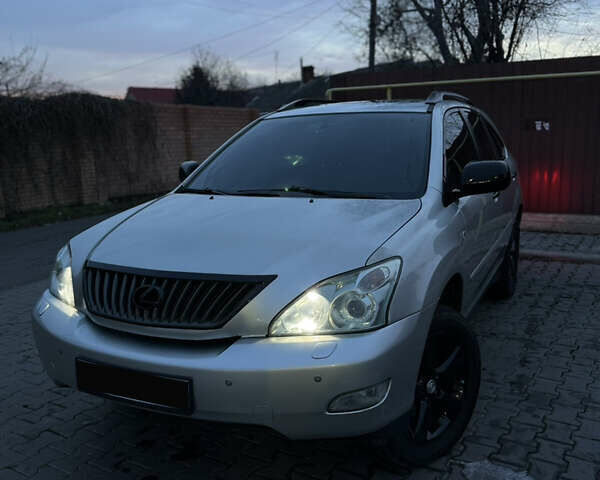 Сірий Лексус РХ, об'ємом двигуна 3.46 л та пробігом 380 тис. км за 11000 $, фото 1 на Automoto.ua