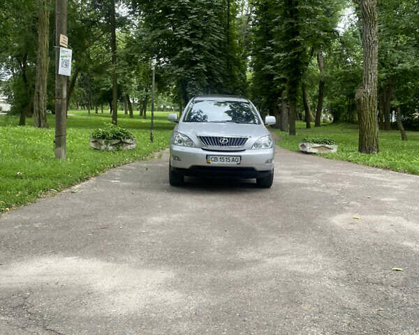 Сірий Лексус РХ, об'ємом двигуна 3.46 л та пробігом 258 тис. км за 12500 $, фото 1 на Automoto.ua