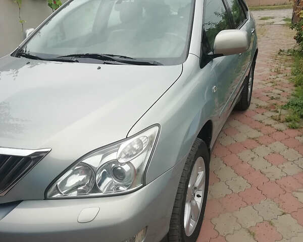 Сірий Лексус РХ, об'ємом двигуна 3.46 л та пробігом 170 тис. км за 11900 $, фото 1 на Automoto.ua
