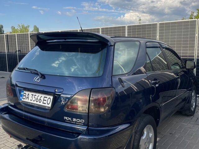 Синій Лексус РХ, об'ємом двигуна 3 л та пробігом 303 тис. км за 5100 $, фото 1 на Automoto.ua