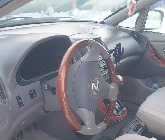 Синий Лексус РХ, объемом двигателя 3 л и пробегом 274 тыс. км за 6500 $, фото 1 на Automoto.ua