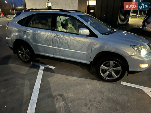 Синий Лексус РХ, объемом двигателя 3.3 л и пробегом 250 тыс. км за 7650 $, фото 1 на Automoto.ua