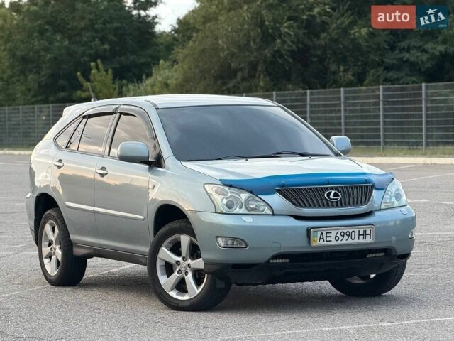 Синий Лексус РХ, объемом двигателя 3.31 л и пробегом 325 тыс. км за 8500 $, фото 1 на Automoto.ua