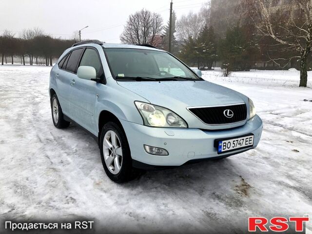 Синий Лексус РХ, объемом двигателя 3.5 л и пробегом 244 тыс. км за 9200 $, фото 1 на Automoto.ua