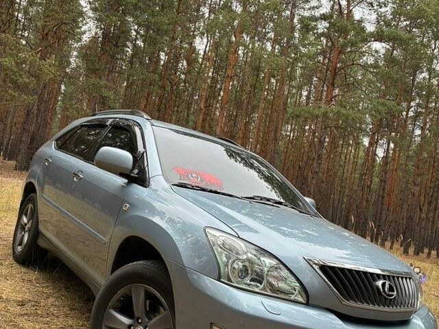 Синий Лексус РХ, объемом двигателя 3.46 л и пробегом 329 тыс. км за 14000 $, фото 1 на Automoto.ua