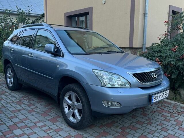Синий Лексус РХ, объемом двигателя 3.5 л и пробегом 204 тыс. км за 12900 $, фото 1 на Automoto.ua