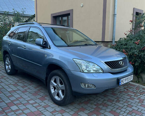 Синий Лексус РХ, объемом двигателя 3.5 л и пробегом 204 тыс. км за 13500 $, фото 1 на Automoto.ua