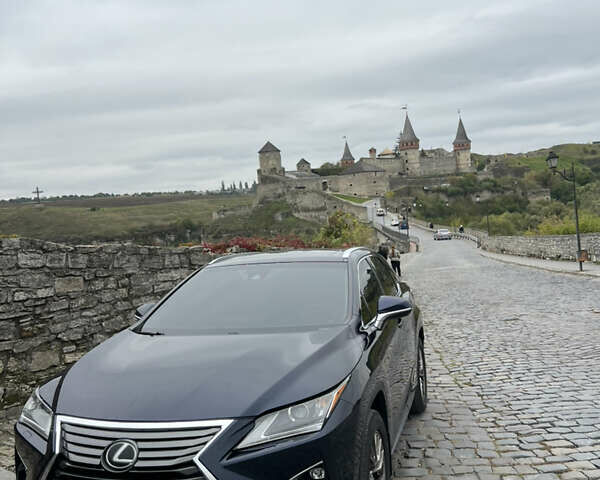 Синий Лексус РХ, объемом двигателя 3.46 л и пробегом 124 тыс. км за 36800 $, фото 1 на Automoto.ua