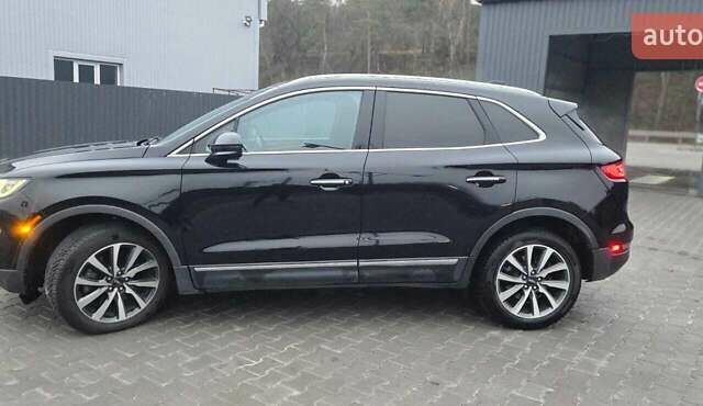 Чорний Лінкольн МКС, об'ємом двигуна 2 л та пробігом 95 тис. км за 20000 $, фото 1 на Automoto.ua