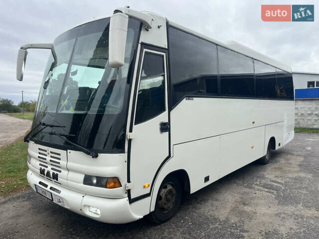 Белый МАН 10.220, объемом двигателя 6.87 л и пробегом 930 тыс. км за 15500 $, фото 1 на Automoto.ua