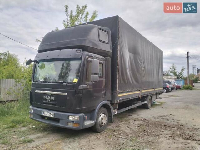Черный МАН 12, объемом двигателя 6.9 л и пробегом 1000 тыс. км за 21499 $, фото 1 на Automoto.ua