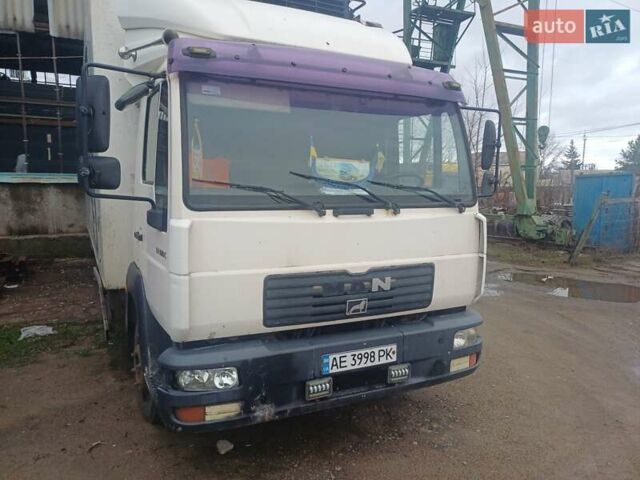 Белый МАН 12.180, объемом двигателя 4.58 л и пробегом 850 тыс. км за 12000 $, фото 1 на Automoto.ua