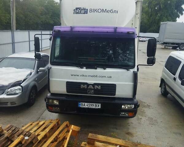 Белый МАН 12.220, объемом двигателя 6.87 л и пробегом 54 тыс. км за 16000 $, фото 1 на Automoto.ua