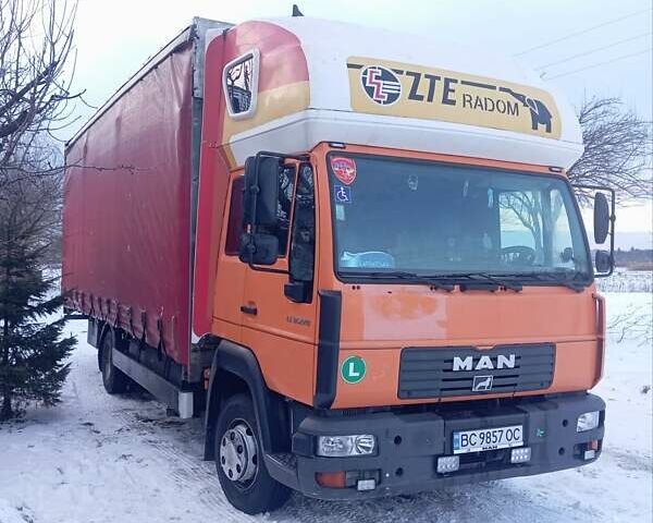 Оранжевый МАН 12.220, объемом двигателя 6.9 л и пробегом 740 тыс. км за 13900 $, фото 1 на Automoto.ua