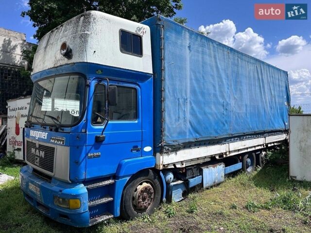 Синий МАН 23.343, объемом двигателя 9.97 л и пробегом 600 тыс. км за 6000 $, фото 1 на Automoto.ua