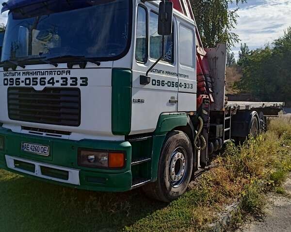 Белый МАН 26.412, объемом двигателя 11.97 л и пробегом 800 тыс. км за 31000 $, фото 1 на Automoto.ua