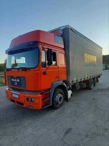 Красный МАН 26.414, объемом двигателя 12 л и пробегом 111 тыс. км за 14700 $, фото 1 на Automoto.ua