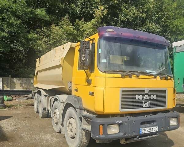 Желтый МАН 33.403, объемом двигателя 11.97 л и пробегом 450 тыс. км за 29000 $, фото 1 на Automoto.ua