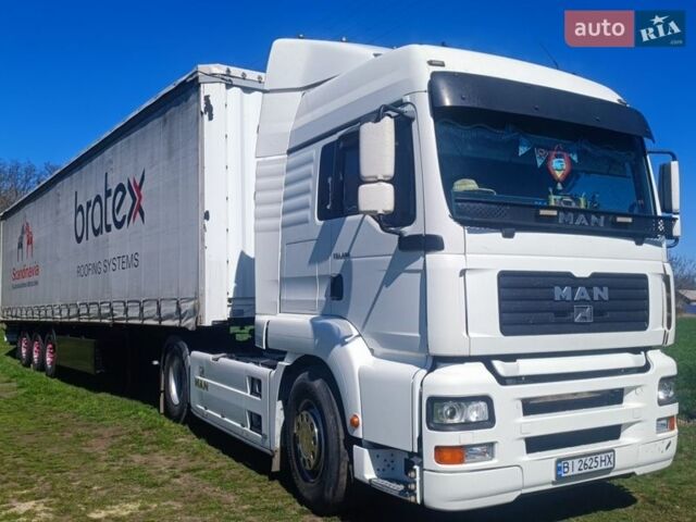 Белый МАН 41.460, объемом двигателя 12.8 л и пробегом 712 тыс. км за 9500 $, фото 1 на Automoto.ua