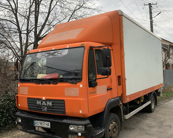Оранжевый МАН 8.150 груз., объемом двигателя 4.58 л и пробегом 498 тыс. км за 13500 $, фото 1 на Automoto.ua