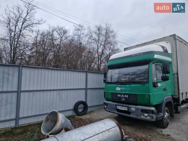 Зеленый МАН 8.223, объемом двигателя 6.87 л и пробегом 950 тыс. км за 14000 $, фото 1 на Automoto.ua