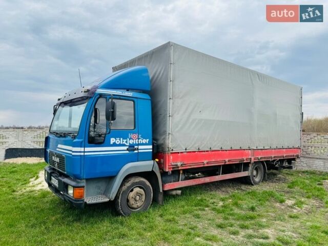 Синий МАН 8.224, объемом двигателя 6.87 л и пробегом 400 тыс. км за 12800 $, фото 1 на Automoto.ua