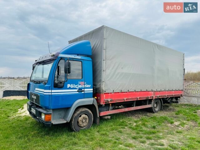 Синий МАН 8.224, объемом двигателя 6.87 л и пробегом 400 тыс. км за 12300 $, фото 1 на Automoto.ua