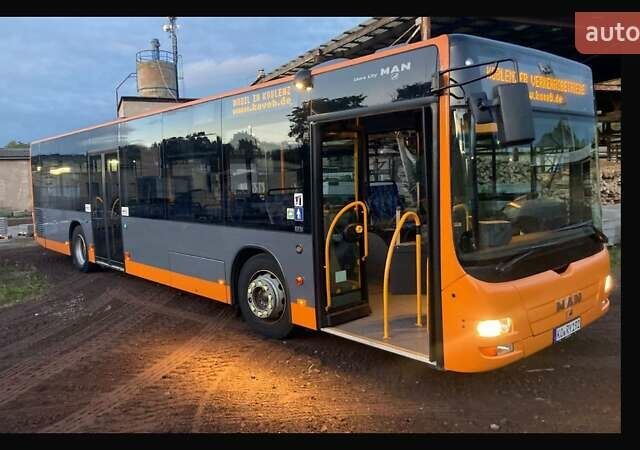 Оранжевый МАН A21, объемом двигателя 12 л и пробегом 700 тыс. км за 15764 $, фото 1 на Automoto.ua