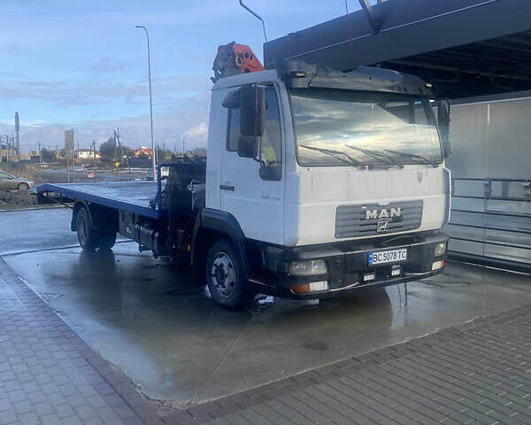 Белый МАН Л 2000, объемом двигателя 4.6 л и пробегом 880 тыс. км за 18800 $, фото 1 на Automoto.ua