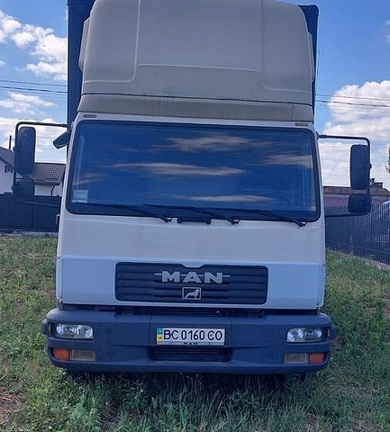 Белый МАН Л 2000, объемом двигателя 6.8 л и пробегом 502 тыс. км за 13600 $, фото 1 на Automoto.ua