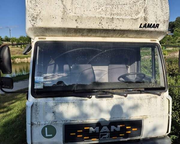 Белый МАН Л 2000, объемом двигателя 4.58 л и пробегом 377 тыс. км за 5800 $, фото 1 на Automoto.ua