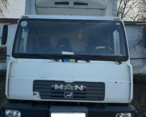 Белый МАН Л 2000, объемом двигателя 4.58 л и пробегом 300 тыс. км за 12500 $, фото 1 на Automoto.ua