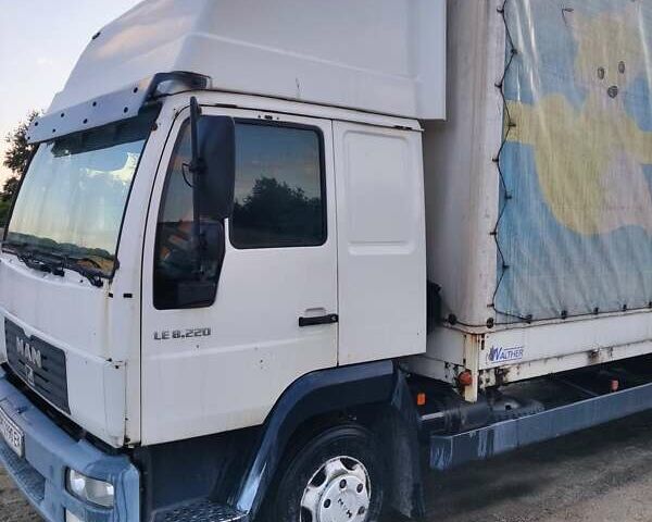 Белый МАН Л 2000, объемом двигателя 6.87 л и пробегом 700 тыс. км за 15000 $, фото 1 на Automoto.ua