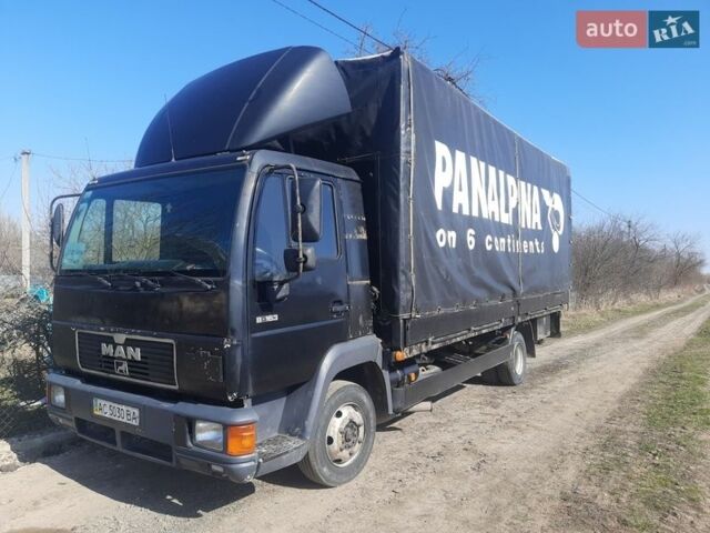 Чорний МАН L 2000, об'ємом двигуна 4.58 л та пробігом 248 тис. км за 7500 $, фото 1 на Automoto.ua