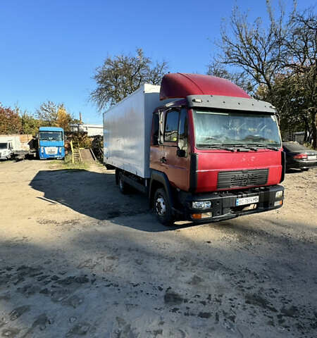 Красный МАН Л 2000, объемом двигателя 4.85 л и пробегом 760 тыс. км за 8999 $, фото 1 на Automoto.ua