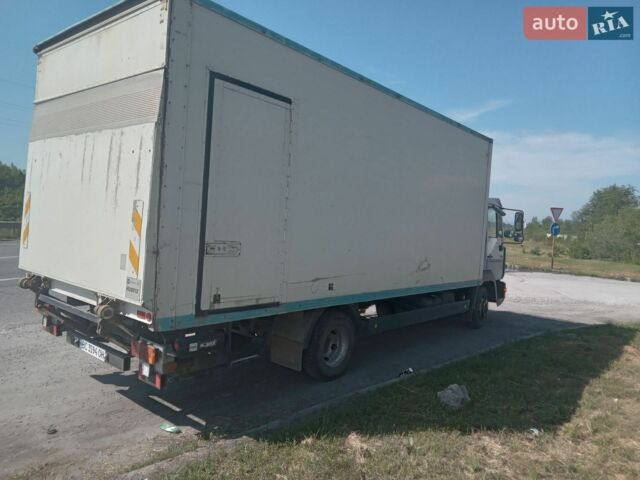 Синий МАН Л 2000, объемом двигателя 4.58 л и пробегом 487 тыс. км за 12500 $, фото 1 на Automoto.ua
